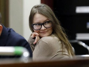 Anna Sorokin sits at the defense table in New York State Supreme Court, in New York, Wednesday, March 27, 2019. Sorokin, who claimed to be a German heiress, is on trial on grand larceny and theft of services charges.