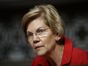 File-This Feb. 29, 2019, file photo shows Senate Armed Services Committee member, Sen. Elizabeth Warren, D-Mass., during a Senate Armed Services Committee hearing on "Nuclear Policy and Posture" on Capitol Hill in Washington. Sen. Warren, who is seeking the Democratic nomination for president in 2020, did not call for the minimum wage to be $22 an hour, as posts circulating on social media suggest. However, she did discuss the findings of a study that showed if minimum wage had been tied to productivity between 1960 and 2013, it would be $22 an hour, during a March 2013 Senate Committee on Health, Education, Labor and Pensions hearing.
