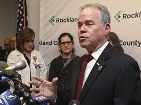 Rockland County Executive Ed Day speaks to the media, Tuesday, March 26, 2019, at his New City, N.Y., office. Day announced a state of emergency that bars minors who were not vaccinated against measles from public spaces in Rockland County. The measles outbreak has infected more than 150 people since the fall of 2018 and Day said he was taking the action in hopes of reversing a recent uptick in cases.