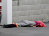 A body lies on the footpath outside a mosque in Christchurch, New Zealand, March 15, 2019.