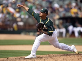 Oakland Athletics pitcher Frankie Montas delivers against the San Francisco Giants during the ninth inning of an exhibition baseball game, Sunday, March 24, 2019, in Oakland, Calif. The A's defeated the Giants 5-0.