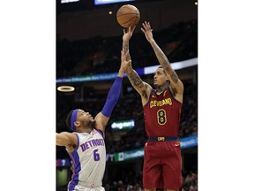 Cleveland Cavaliers' Jordan Clarkson (8) shoots over Detroit Pistons' Bruce Brown (6) in the first half of an NBA basketball game, Saturday, March 2, 2019, in Cleveland.