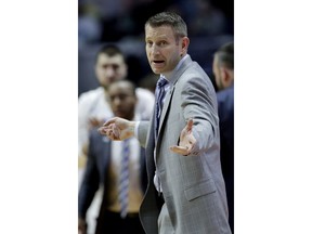 Buffalo head coach Nate Oats talks to his players during the first half of a second round men's college basketball game against Texas Tech in the NCAA Tournament Sunday, March 24, 2019, in Tulsa, Okla.