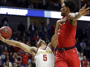 Iowa State's Lindell Wigginton (5) throws up a shot as Ohio State's Musa Jallow defends during the first half of a first round men's college basketball game in the NCAA Tournament Friday, March 22, 2019, in Tulsa, Okla.