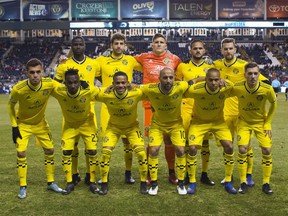 Columbus Crew poses for their starting 11 photo prior to an MLS soccer match against the Philadelphia Union, Saturday, March 23, 2019, in Chester, Pa.