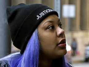 Kyra Jamison, the sister of Antwon Rose II, enters the Allegheny County Courthouse on the second day of the trial for Michael Rosfeld, a former police officer in East Pittsburgh, Pa., Wednesday, March 20, 2019. Rosfeld is charged with homicide in the fatal shooting of Antwon Rose II as he fled during a traffic stop on June 19, 2018.