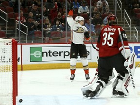 Anaheim Ducks right wing Jakob Silfverberg, left, celebrates his goal against Arizona Coyotes goaltender Darcy Kuemper (35) during the first period of an NHL hockey game Tuesday, March 5, 2019, in Glendale, Ariz.