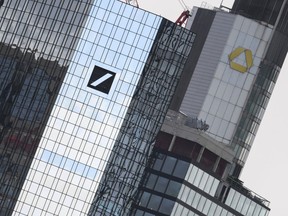 File-Picture taken March 11, 2019 shows the head offices of Deutsche Bank, left, and Commerzbank, right.