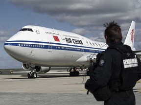 The plane carrying Chinese President Xi Jinping and his wife Peng Liyuan taxis on the tarmac after landing at Roissy Charles-de-Gaulle airport near Paris, France, Monday, March 25, 2019. Chinese President Xi Jinping is on a 3-day state visit in France where he is expected to sign a series of bilateral and economic deals on energy, the food industry, transport and other sectors.