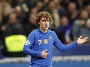 France's Antoine Griezmann celebrates scoring his side's 4th goal during the Euro 2020 group H qualifying soccer match between France and Iceland at the Stade de France in Saint Denis, north of Paris, Monday, March 25, 2019.