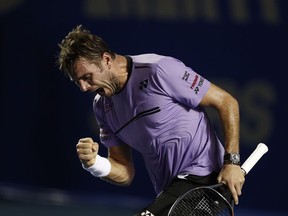 Switzerland's Stan Wawrinka celebrates as he wins a hard-fought second set in his Mexican Tennis Open quarterfinal match against Australia's Nick Kyrgios, in Acapulco, Mexico, Thursday, Feb. 28, 2019.
