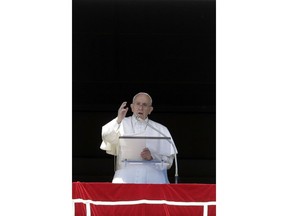 Pope Francis delivers a blessing from his studio's window overlooking St. Peter's Square during the Angelus noon prayer at the Vatican, Sunday, March 24, 2019.