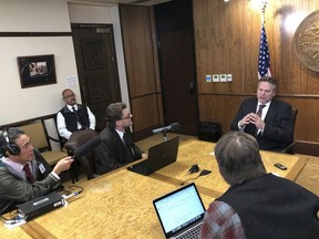 Alaska Gov. Mike Dunleavy speaks to reporters in Juneau, Alaska Friday, March 8, 2019. Gov. Mike Dunleavy says he's eager for the Alaska Legislature to offer alternatives for addressing the state's ongoing deficit. Dunleavy says that while he attends an energy conference next week in Texas he hopes the legislature will "get serious" about budget proposals. House and Senate lawmakers have been working through details of Dunleavy's budget, which was introduced last month. His plan to fill a projected $1.6 billion deficit includes sweeping cuts to areas such as education, health and social service programs and the state ferry system and tax collection changes that would benefit the state but take money from some communities.