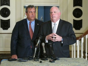 Maryland Gov. Larry Hogan, right, talks to reporters with former New Jersey Gov. Chris Christie, left, on Thursday, March 21, 2019 at the governor's residence in Annapolis, Md. Hogan, who still isn't entirely ruling out a potential primary challenge to President Donald Trump because it's unclear what the future holds, said that currently "it doesn't make any sense at all." Christie says he doesn't see a political path at the moment for challenging Trump, because of the president's approval ratings among Republicans.