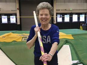 In this Thursday, March 13, 2019 photo, Florence "Flo" Filion Meiler, an 84-year-old record-setting pole vaulter, poses while training at the University of Vermont indoor track in Burlington, Vt. Meiler is headed to the world championships in Poland. She is competing in track and field events including the long jump, 60-meter hurdles, 800-meter run and pentathlon. But she's a shoo-in for the pole vault.