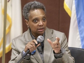 In this March 24, 2019 photo, Chicago mayoral candidate Lori Lightfoot participates in a candidate forum sponsored by One Chicago For All Alliance at Daley College in Chicago. Lightfoot and Toni Preckwinkle, left, are competing to make history by becoming the city's first black, female mayor. On issues their positions are similar. But their resumes are not, and that may make all the difference when voters pick a new mayor on Tuesday.