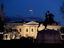 The White House is seen at dusk, March 22, 2019, in Washington. Special counsel Robert Mueller has concluded his investigation into Russian election interference and possible coordination with associates of President Donald Trump.