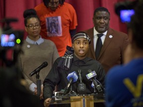 Stevante Clark, the brother of Stephon Clark who was killed by police last year, speaks during a news conference at the Genesis Church in Sacramento, Calif., Sunday, March 3, 2019. Standing behind Clark are National Action Network representative Margaret Fortune, left, Clark's uncle Curtis Gordon, and Tecoy Porter Sr., pastor at the Genesis Church. Clark's comments followed Saturday's announcement by Sacramento District Attorney Anne Marie Schubert that the two officers who shot and killed Stephon Clark will not be charged in the shooting.