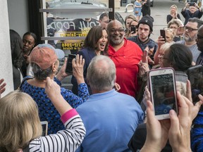In this March 8, 2019 photo, Sen. Kamala  Harris, meets with supporters at Big Mike's Soul Food, in Myrtle Beach, S.C. Democrats' road back to the White House runs through the Republican-run South, and not just in the early nominating state of South Carolina.