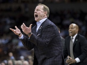 Mississippi head coach Kermit Davis reacts after a play against Oklahoma during a first round men's college basketball game in the NCAA Tournament Friday, March 22, 2019, in Columbia, S.C.