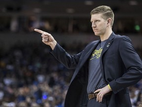 North Dakota State coach David Richman communicates with a player during the first half against Duke in a first-round game in the NCAA men's college basketball tournament Friday, March 22, 2019, in Columbia, S.C.