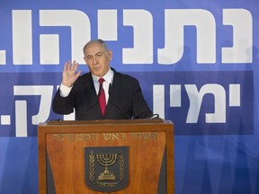 Israeli Prime Minister Benjamin Netanyahu gestures as he delivers a statement at the Prime Minister's residence in Jerusalem, Thursday, Feb. 28, 2019. Israel's attorney general on Thursday recommended indicting Prime Minister Benjamin Netanyahu with bribery and breach of trust in a series of corruption cases, a momentous move that shook up Israel's election campaign and could spell the end of the prime minister's illustrious political career.