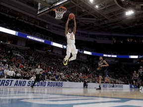 Virginia Tech guard Ahmed Hill dunks against Saint Louis during the first half of a first-round game in the NCAA men's college basketball tournament Friday, March 22, 2019, in San Jose, Calif.