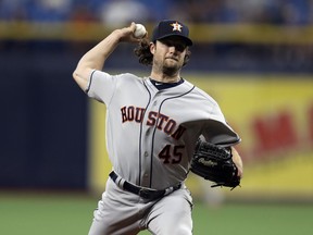 Houston Astros' Gerrit Cole pitches to the Tampa Bay Rays during the first inning of a baseball game Friday, March 29, 2019, in St. Petersburg, Fla.