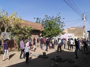 Sudanese protesters take to the streets in the capital Khartoum's district of Burri to demonstrate against the government on February 24, 2019. - Riot police swiftly confronted protesters in Omdurman and Burri with tear gas, witnesses said, as protest organisers have vowed to continue with daily rallies, accusing President Omar al-Bashir and his officials of economic mismanagement that has led to soaring food prices and shortage of foreign currency.