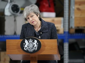 Britain's Prime Minister Theresa May listens to a question after delivering a speech at Orsted East Coast Hub in the North Sea fishing port, Grimsby on March 8, 2019.