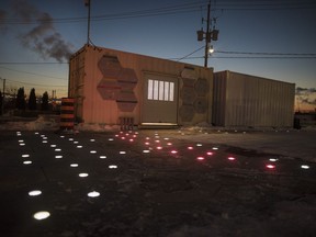 Modular pavement that features lighting, selective heating, and porous slabs designed to soak up water into a stormwater management system, are photographed during a media preview of Open Sidewalk - Winter Warmer in Toronto on Friday, March 1, 2019. The CEO of an Alphabet-backed entity planning for a high tech neighbourhood in Toronto says the company may pull out of the project if it can't get transit built in the neighbourhood.