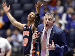 Auburn head coach Bruce Pearl reacts to a call against his team in the first half of an NCAA college basketball game against South Carolina at the Southeastern Conference tournament Friday, March 15, 2019, in Nashville, Tenn.