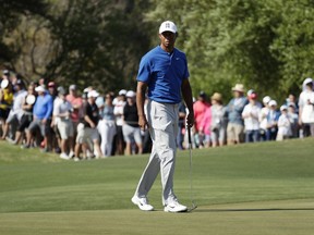 Tiger Woods prepares to putt on the 16th hole during round-robin play at the Dell Match Play Championship golf tournament Wednesday, March 27, 2019, in Austin, Texas.