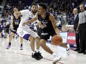 TCU guard Alex Robinson (25) defends as Kansas State guard Kamau Stokes (3) works to the basket for a shot in the first half of an NCAA college basketball game in Fort Worth, Texas, Monday, March 4, 2019.