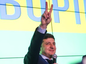 Ukrainian comedian Volodymyr Zelenskiy smiles as exit polls for the presidential elections indicated he'd get about 30 per cent of the vote.