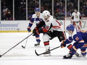 New York Islanders center Valtteri Filppula (51), of Finland, defends against Ottawa Senators left wing Zack Smith (15) during the first period of an NHL hockey game Tuesday, March 5, 2019, in Uniondale, N.Y.