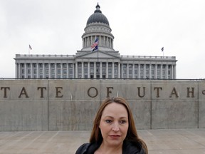 In this Feb. 27, 2019, photo, Michelle Aldana is shown at the Utah State Capitol in Salt Lake City. Utah is one of at least four states considering bans this year on the shackling of incarcerated women during childbirth. The Utah measure has passed the state House and is being considered by the Senate. The measure is a relief for mothers like Aldana, who was shackled when she gave birth while incarcerated on a drug charge in 2001.