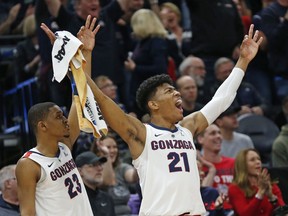 Gonzaga's Zach Norvell Jr. (23) and Rui Hachimura (21) celebrate a score against Baylor during the first half of a second-round game in the NCAA men's college basketball tournament Saturday, March 23, 2019, in Salt Lake City.