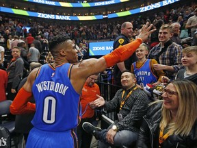 CORRECTS DATELINE TO SALT LAKE CITY INSTEAD OF KEARNS, UTAH - Oklahoma City Thunder guard Russell Westbrook (0) waves to the crowd as he leaves the court following an NBA basketball game against the Utah Jazz, Monday, March 11, 2019, in Salt Lake City.