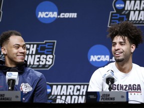 Gonzaga's Geno Crandall, left, and Josh Perkins, right, speak during a news conference at the NCAA men's college basketball tournament Wednesday, March 20, 2019, in Salt Lake City.