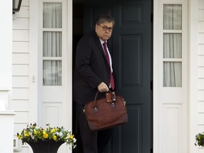 Attorney General William Barr leaves his home in McLean, Va., on Friday, March 22, 2019. Special Counsel Robert Mueller is expected to present a report to the Justice Department any day now outlining the findings of his nearly two-year investigation into Russian election meddling, possible collusion with Trump campaign officials and possible obstruction of justice by Trump .