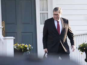 Attorney General William Barr leaves his McLean, Va., home on Monday, March 25, 2019.