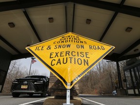 A sign warning of road conditions is on display at the Swift Run Gap entrance of the Shenandoah National Park near Elkson, Va., Wednesday, March 20, 2019. The southern portion of the Skyline drive in the park has been closed since November due to severe winter storms.