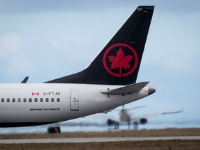 An Air Canada Boeing 737 Max 8 aircraft taxis to a runway at Vancouver International Airport on March 12, 2019.