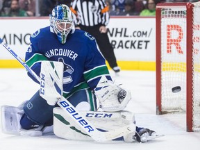 Vancouver Canucks goalie Jacob Markstrom, of Sweden, makes a save during the third period of an NHL hockey game against the Dallas Stars in Vancouver, on Saturday March 30, 2019.