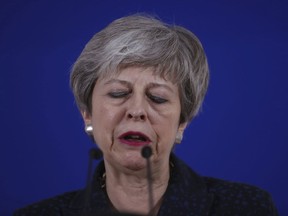 British Prime Minister Theresa May speaks during a media conference at an EU summit in Brussels, Friday, March 22, 2019. Worn down by three years of indecision in London, EU leaders on Thursday were grudgingly leaning toward giving the U.K. more time to ease itself out of the bloc.