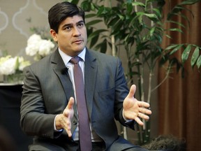 In this Monday, March 11, 2019, photo, Costa Rican president Carlos Alvarado gestures as he takes part in an interview with The Associated Press in Seattle. Alvarado said that Central America should not be satisfied until Nicaragua holds free elections and re-establishes a free press, democracy and human rights guarantees, and that turmoil in Nicaragua is having an impact on regional immigration and the economy.