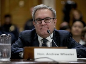 FILE - In this Jan. 16, 2019 file photo, Andrew Wheeler is shown at a Senate Environment and Public Works Committee hearing to be the administrator of the Environmental Protection Agency, on Capitol Hill in Washington.  Wheeler is telling CBS News in an interview airing Wednesday morning that climate change is "an important issue," but that most of the threats it poses are "50 to 75 years out."