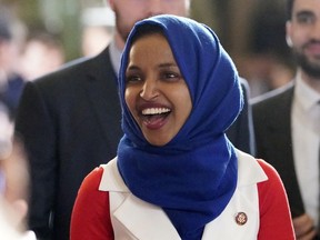 In this Feb. 5, 2019 photo, Rep. Ilhan Omar, D-Minn., arrives for President Donald Trump's State of the Union address to a joint session of Congress on Capitol Hill in Washington. Omar's latest remarks about Israel are prompting House Democrats to draft a resolution condemning anti-Semitism.