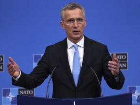 FILE - In this Feb. 14, 2019, file photo, NATO Secretary-General Jens Stoltenberg talks to journalists during a news conference at the second day of a NATO defense ministers meeting at NATO headquarters in Brussels. Leaders of both parties are inviting Stoltenberg to address a joint meeting of Congress next month around the 70th anniversary of the trans-Atlantic alliance
